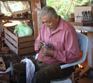 Native craftsmen quietly practice their time-honored work on the trails around Yelapa.